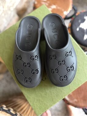 Gucci Black Logo Perforated Slip-Ons Mules platform clogs rubber interlocking.